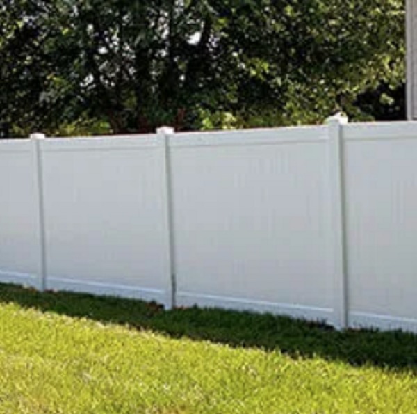 tall white vinyl fence